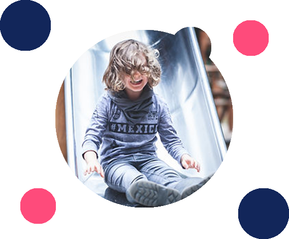 Happy child on a slide