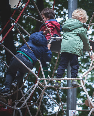 Children climbing rope structure